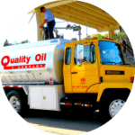 Fuel Oil 1 Photo of Quality Oil employee refueling a commercial fueling vehicle.